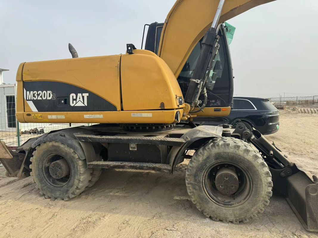90% Caterpillar M317D2 Digunakan Excavator Roda dengan kualitas tinggi dan kinerja terbaik untuk dijual