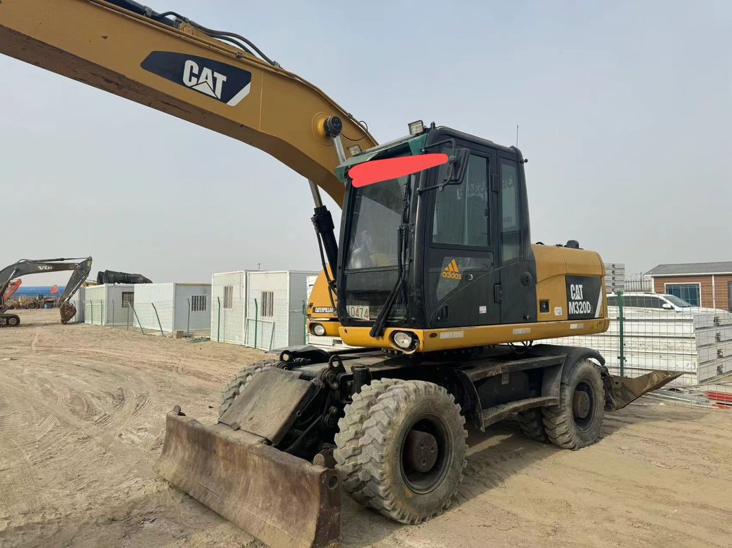 90% Caterpillar M317D2 Digunakan Excavator Roda dengan kualitas tinggi dan kinerja terbaik untuk dijual