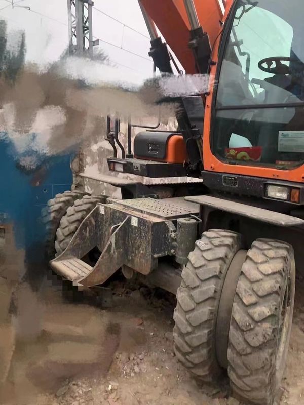15 ton Korea diimpor 90% baru Doosan DX 140W bekas Excavator Roda dengan kualitas tinggi dan kinerja terbaik untuk dijual