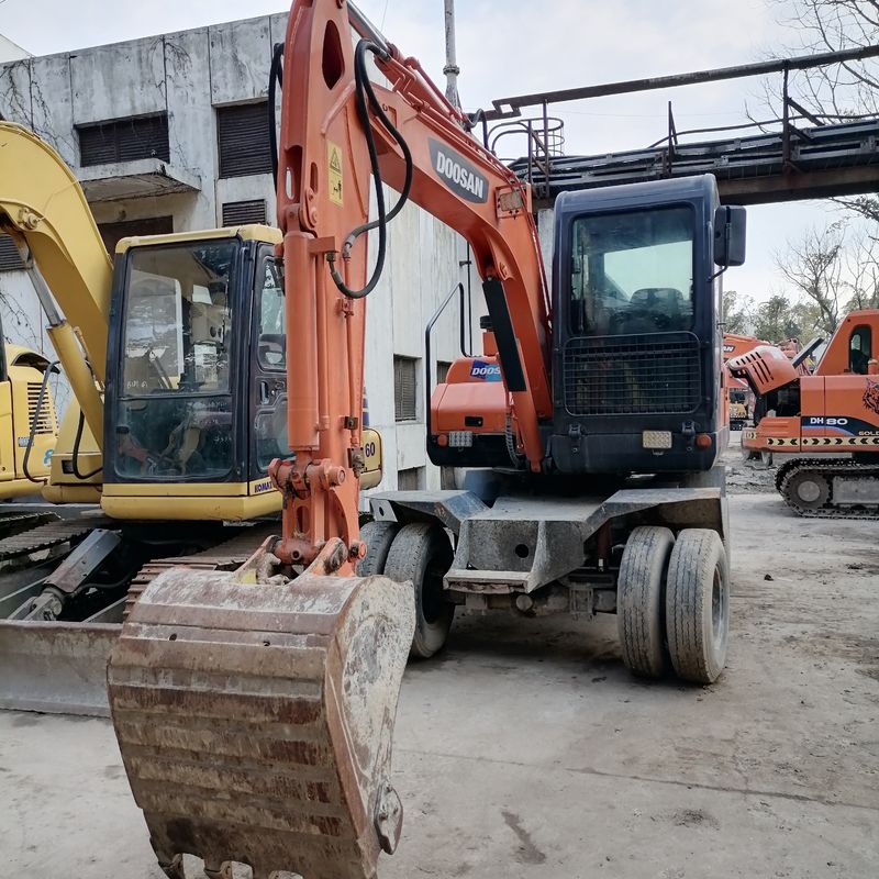 5 ton Korea diimpor 90% baru Doosan DX 60W bekas Excavator Roda dengan kualitas tinggi dan kinerja terbaik untuk dijual