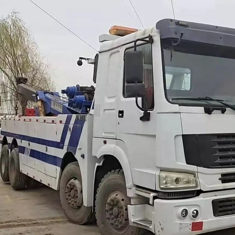 4x2/6x2/6x4/8x4/8x6/4x4/6x6 Jenis Pengemudi Truk Wrecker dengan Daya Tinggi